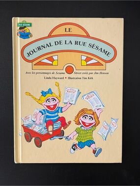 French Sesame Street Book with Colorful Character Illustration